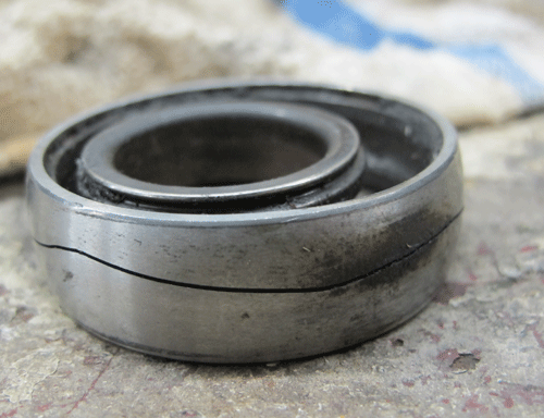This bearing race cracked because the grease wore out.