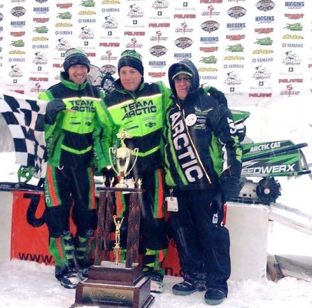 Soo I-500 winners Wes Selby (left) and Brian Dick (center) with Arctic Cat VP and legend Roger Skime (right). Photo lifted from the Soo I-500 Facebook page. 