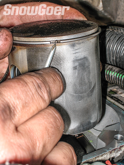 A piston ring locator pin is typically in a position where, when the piston is correctly installed on the connecting rod, the ring will ride against the cylinder wall through full crankshaft rotation. 