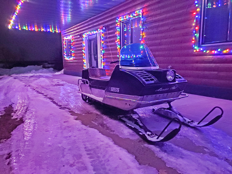 Classic-looking Christmas with snowmobile