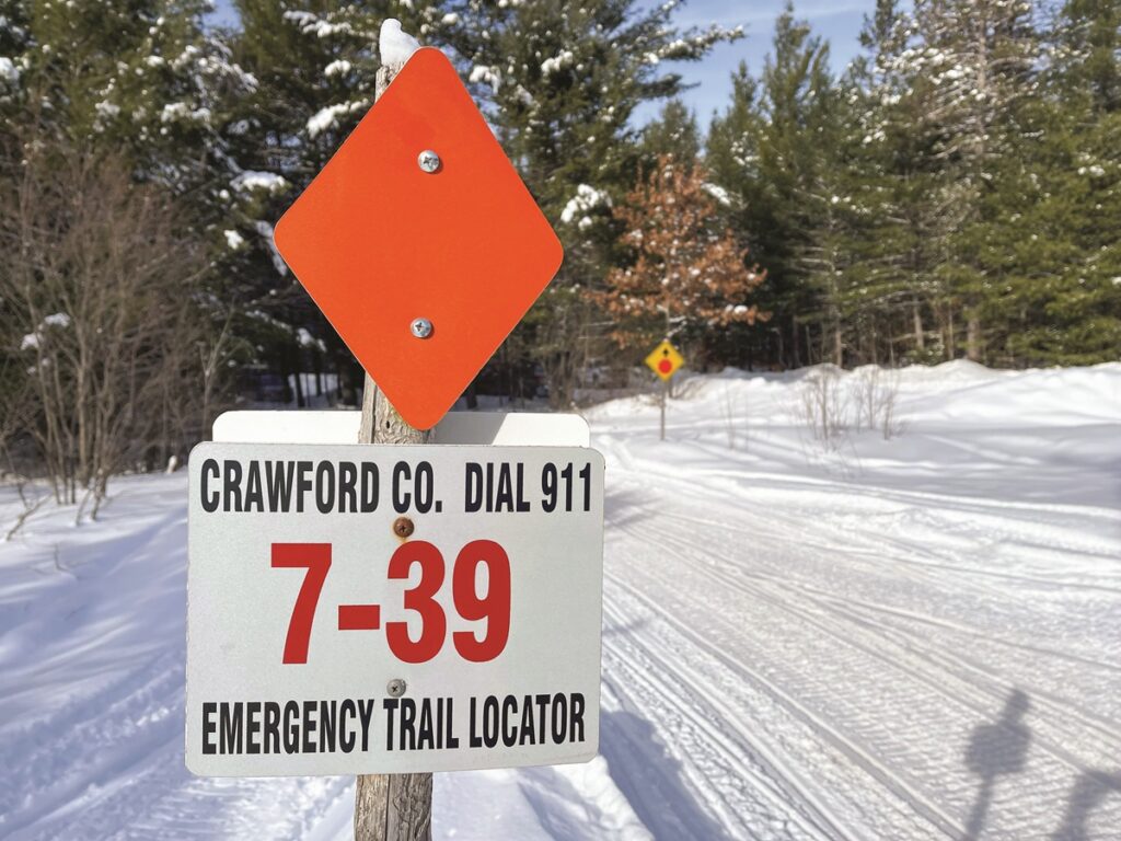 Snowmobiling near Gaylord Michigan on Trail 7 in winter