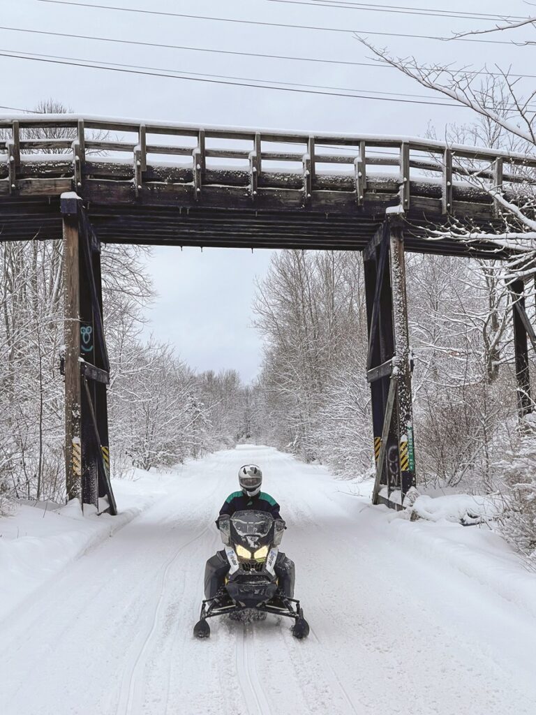 Snowmobilers riding from Gaylord to Mackinaw City trail system